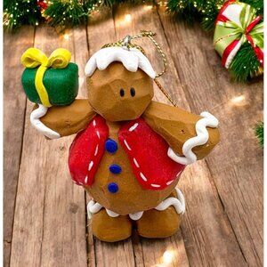 Vintage Gingerbread Man Christmas Tree Ornament Holding Gift Carved Clay Style